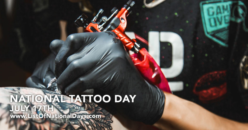A professional Tattoo artist wearing black gloves giving  someone a tattoo with a tattoo gun.
