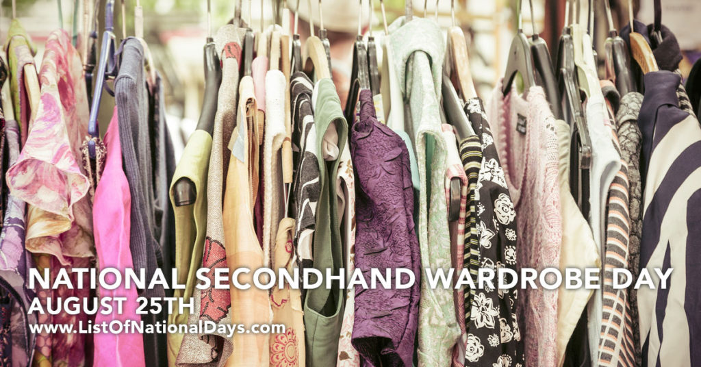 A colorful variety of secondhand clothing hanging on a clothing rack.